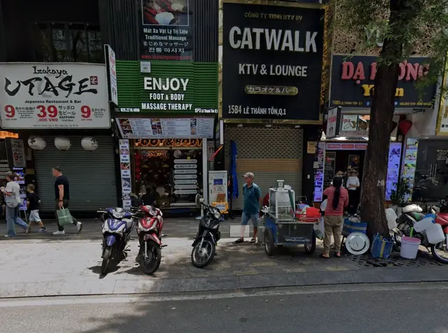 ENJOY massage and CATWALK KTV signs